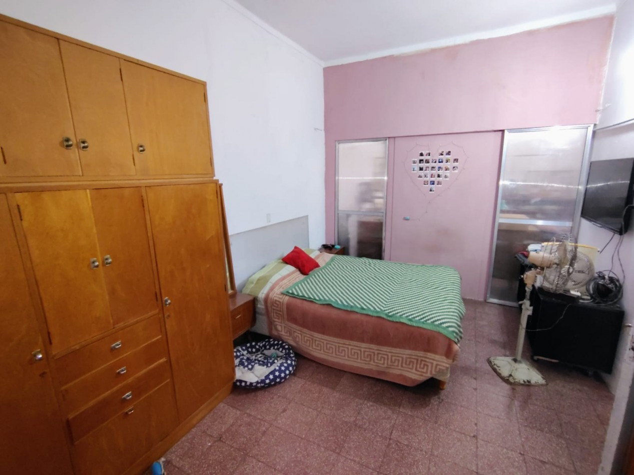 CASA CON GRAN TERRENO  BARRIO FOMENTO 9 DE JULIO 