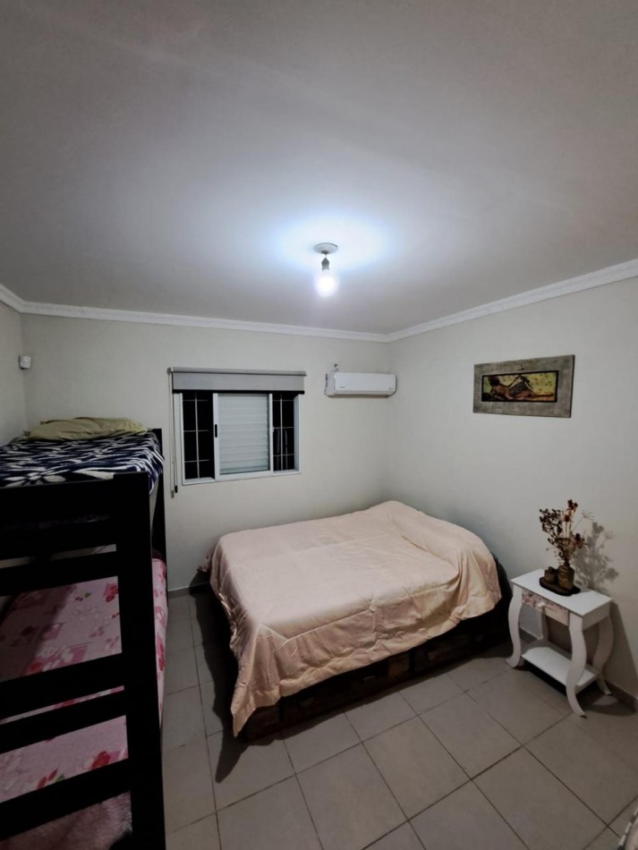 CASA DE 2 DORMITORIOS CON PILETA Y SOLARIUM EN DESVIO ARIJON