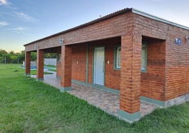 CASA DE 2 DORMITORIOS CON PILETA Y SOLARIUM EN DESVIO ARIJON